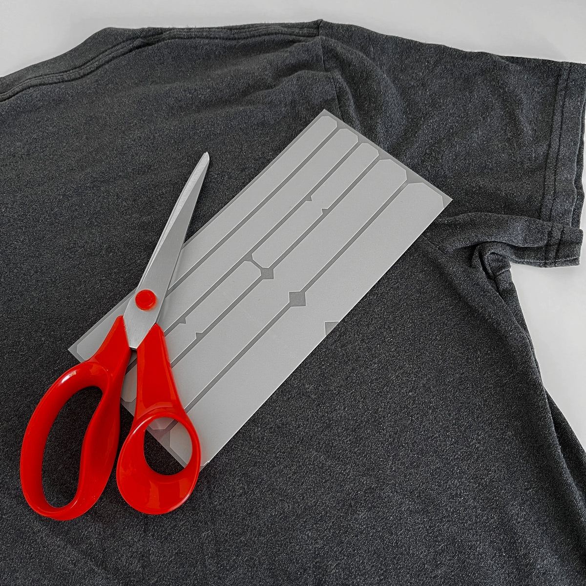Iron On reflective strips with optional cut sections, for clothing by Cyclistick