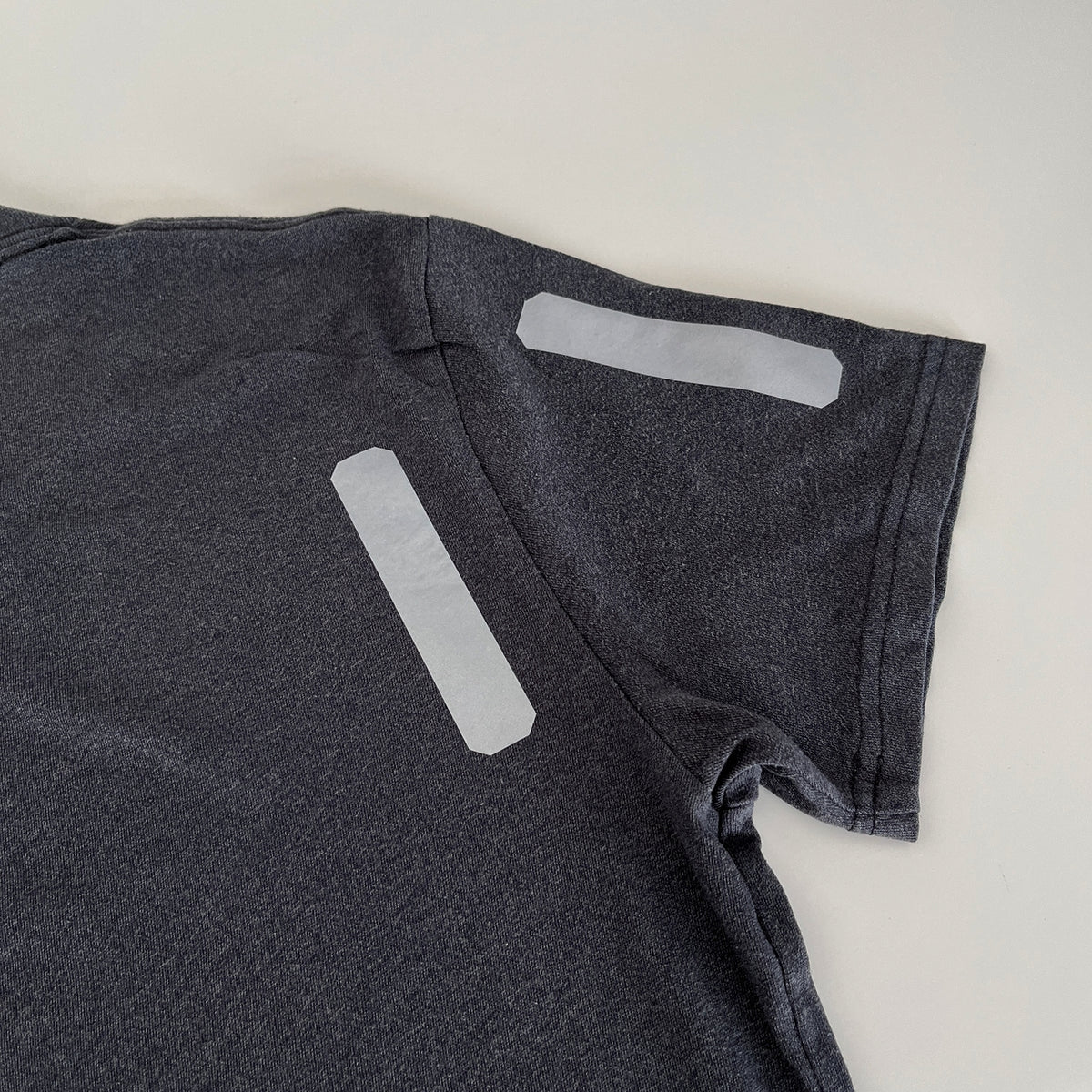 Iron on reflective material for clothing, under natural light by Cyclistick
